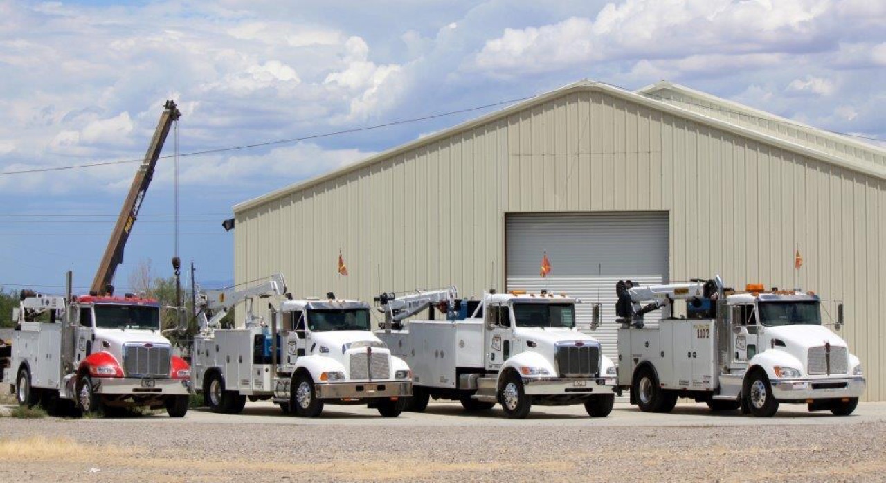 IMM field service trucks staged outside the shop